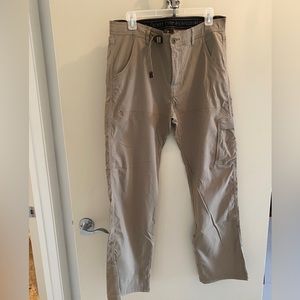 Prana men’s stretch cargo pant. Roll up hem adjustable tab at waist. 34x32 Khaki